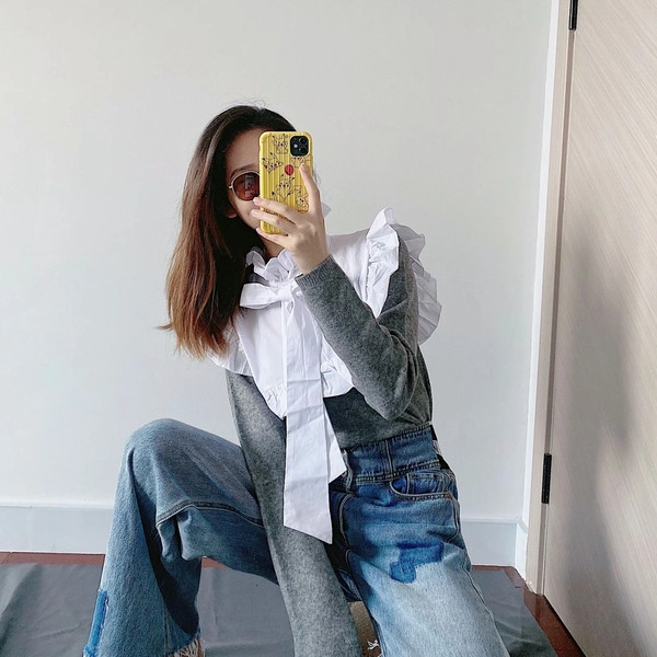 Γυναικείο πουλόβερ με μεγάλο γιακά και κορδέλα