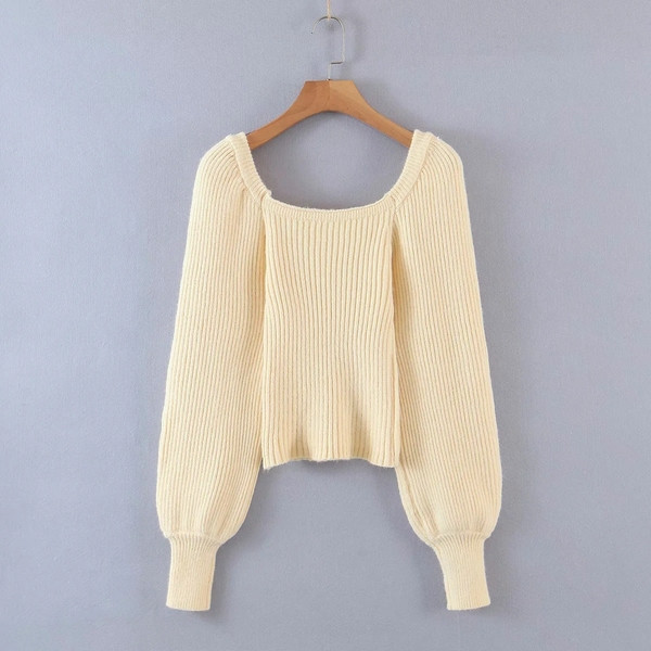 Γυναικείο πουλόβερ με ντεκολτέ και μανίκια