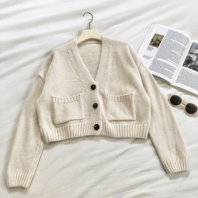 Καθημερινή μοντέρνα γυναικεία ζακέτα  με τσέπες και λαιμόκοψη