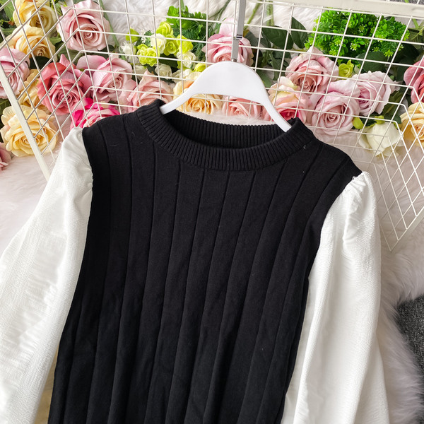 Γυναικείο πουλόβερ με οβάλ ντεκολτέ και μανίκια από τούλι