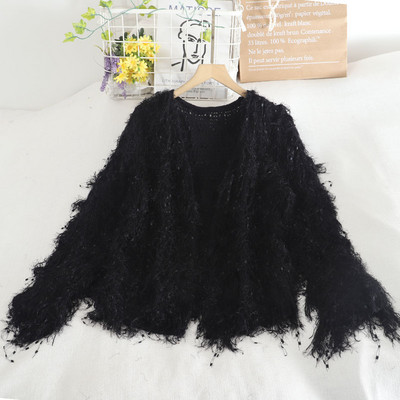 Μοντέρνα γυναικεία ζακέτα με πούλιες και φούντες