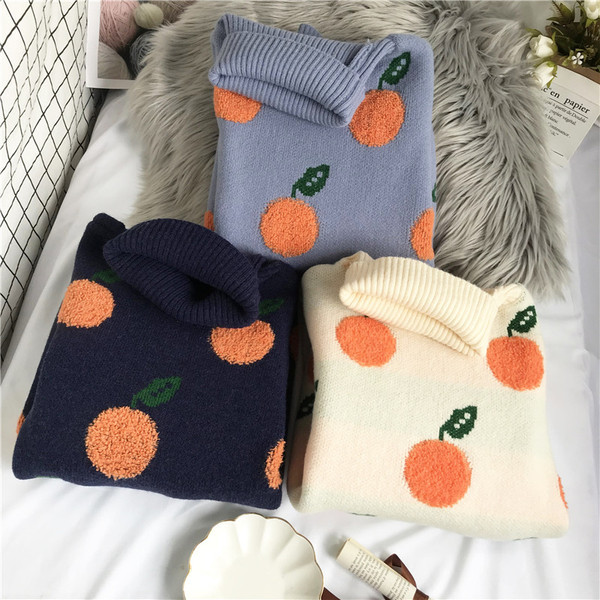 Γυναικείο πουλόβερ μοντέρνο με ψηλό κολάρο και σχέδιο