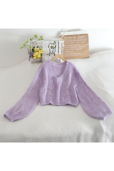 Praegune pikkade varrukatega ja spitsikaelusega naiste kampsun