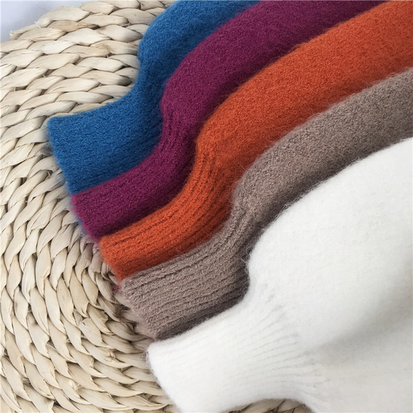 Ασύμμετρο γυναικείο πουλόβερ με οβάλ λαιμόκοψη