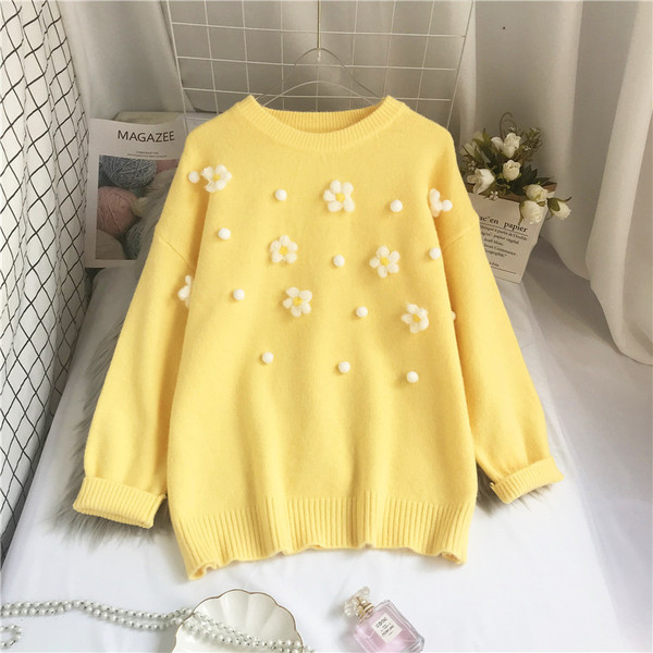 Νέο μοντέλο γυναικείο πουλόβερ με στρογγυλή λαιμόκοψη και τρισδιάστατο στοιχείο