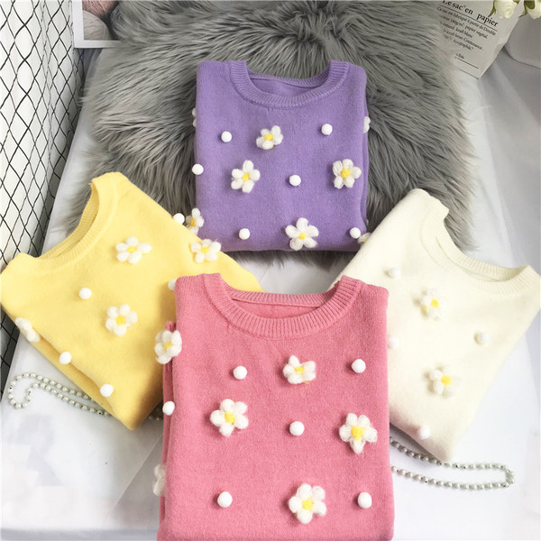 Νέο μοντέλο γυναικείο πουλόβερ με στρογγυλή λαιμόκοψη και τρισδιάστατο στοιχείο