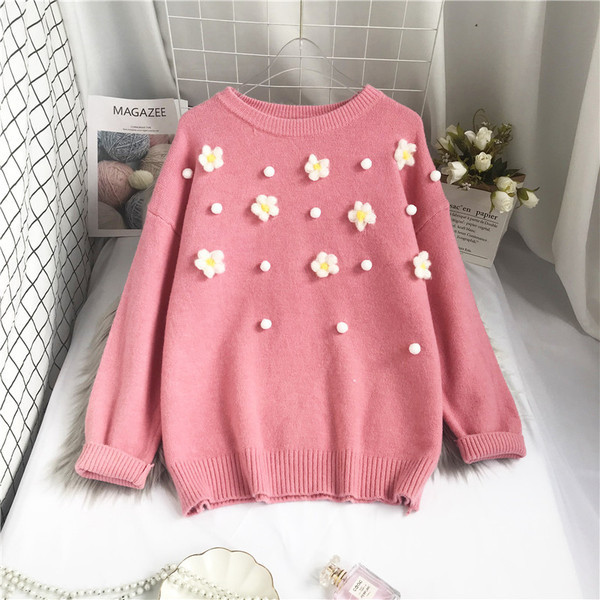 Νέο μοντέλο γυναικείο πουλόβερ με στρογγυλή λαιμόκοψη και τρισδιάστατο στοιχείο