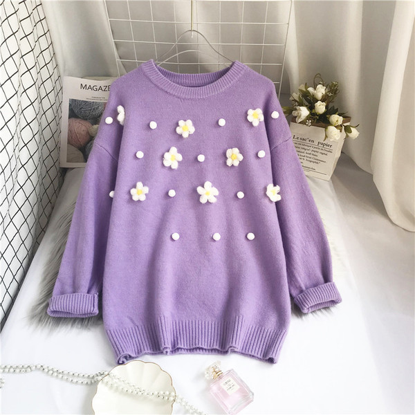 Νέο μοντέλο γυναικείο πουλόβερ με στρογγυλή λαιμόκοψη και τρισδιάστατο στοιχείο