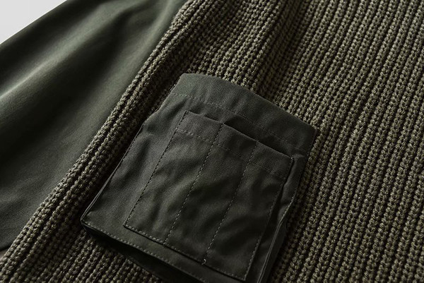 Γυναικείο πουλόβερ με τσέπη και υφασμάτινα μανίκια