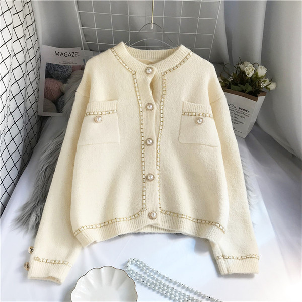 Novi model ženskog kardigana sa džepom i gumbima