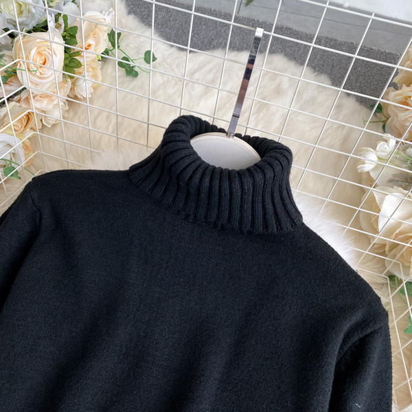 Γυναικείο πουλόβερ σε μαυρό  χρώμα με γιακά