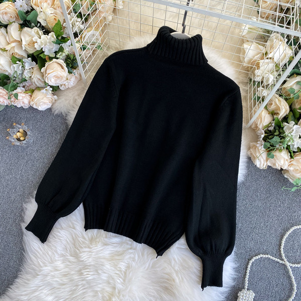 Γυναικείο πουλόβερ σε μαυρό  χρώμα με γιακά