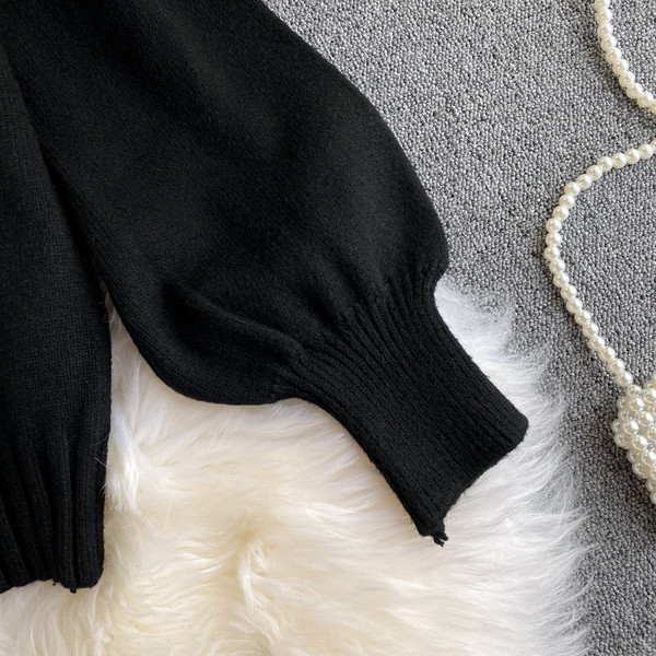 Γυναικείο πουλόβερ σε μαυρό  χρώμα με γιακά