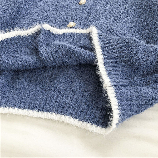 Naiste nööpide ja pärlitega sulevest