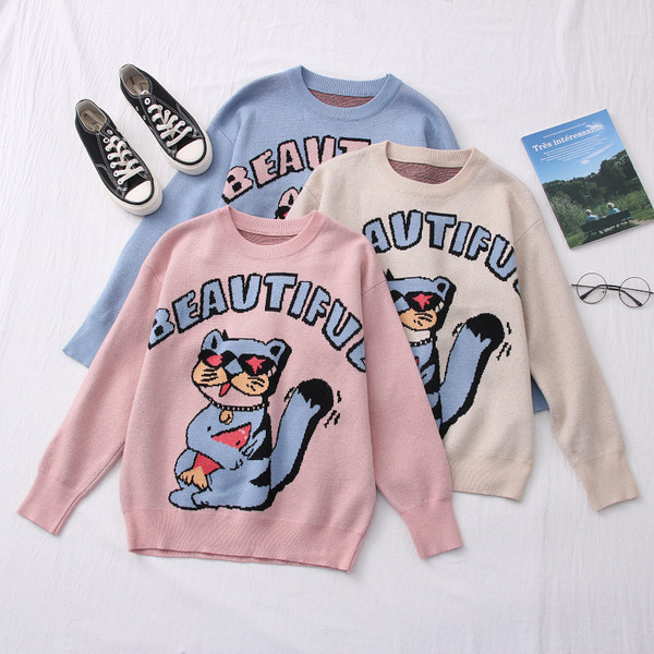 Casual γυναικείο πουλόβερ με κεντήματα και οβάλ ντεκολτέ