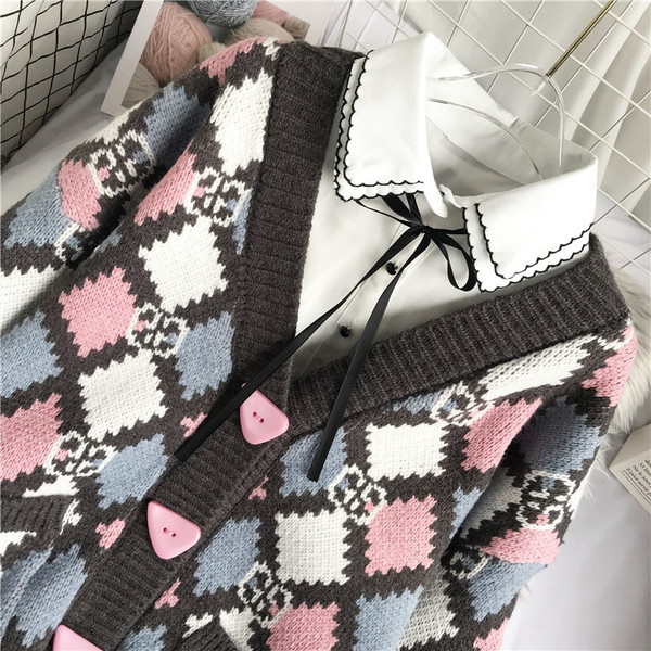 Γυναικεία πλεκτή ζακέτα  μοντέρνα με  λαιμόκοψη