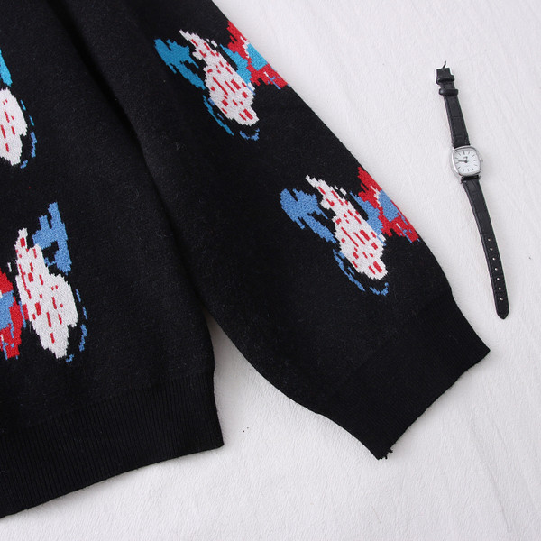 Γυναικεία μαύρη ζακέτα με κουμπιά και λαιμόκοψη