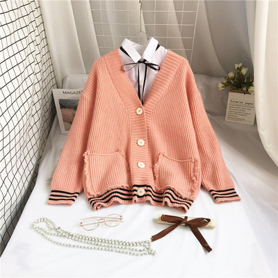 Moodne naiste vest taskute ja pikkade varrukatega