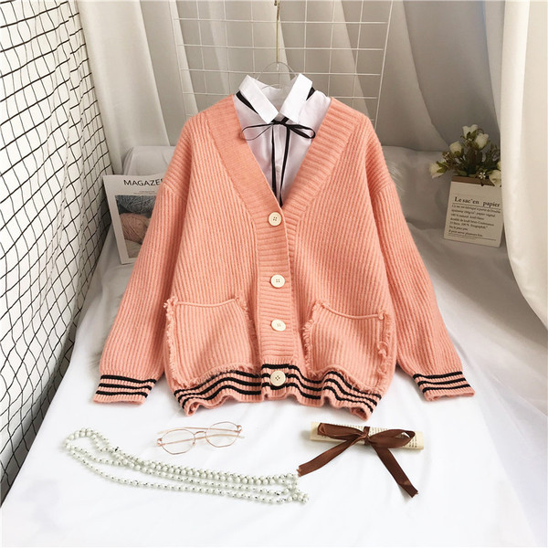 Moodne naiste vest taskute ja pikkade varrukatega