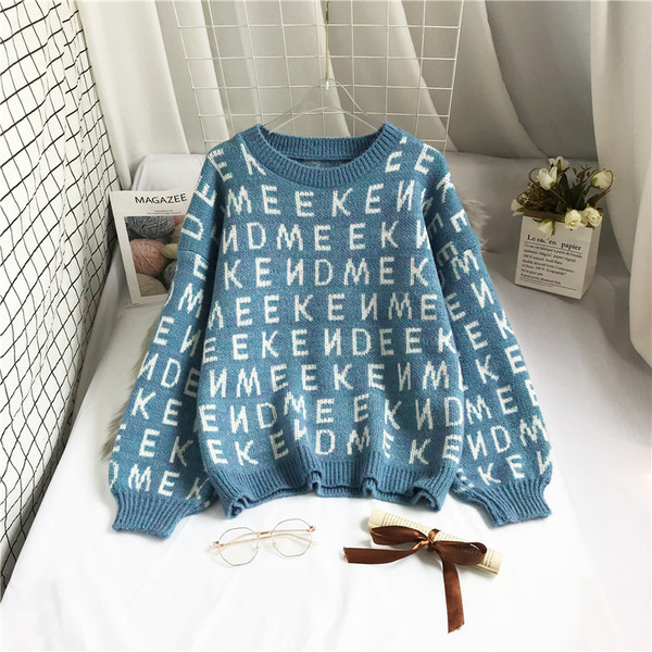 Γυναικείο πουλόβερ με φαρδιά μανίκια και οβάλ λαιμόκοψη