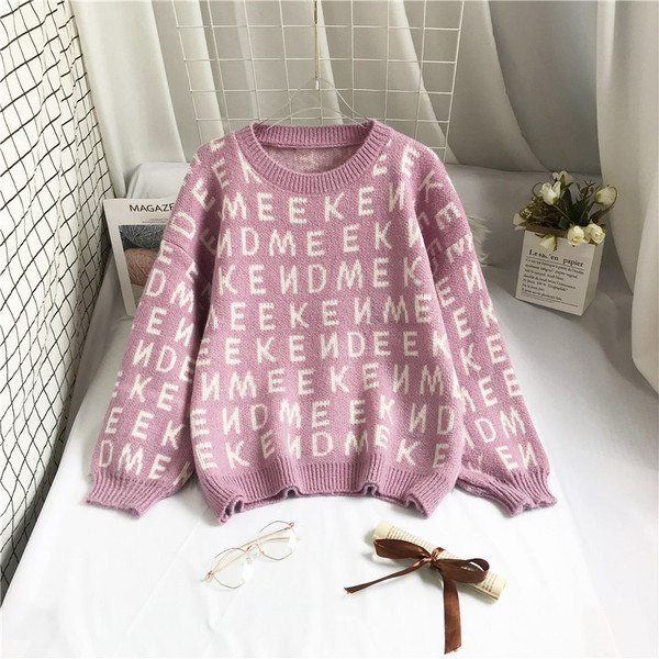 Γυναικείο πουλόβερ με φαρδιά μανίκια και οβάλ λαιμόκοψη