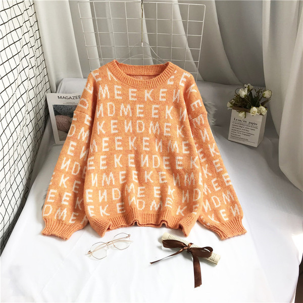 Γυναικείο πουλόβερ με φαρδιά μανίκια και οβάλ λαιμόκοψη