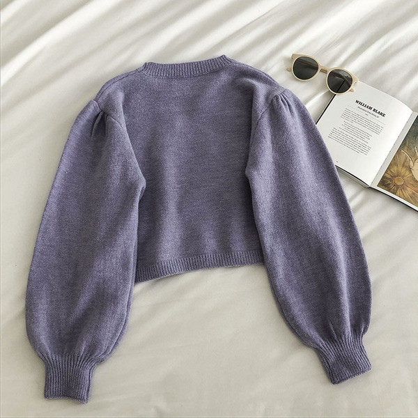 Γυναικείο πουλόβερ με στρογγυλή λαιμόκοψη και ι διακόσμηση πέρλες