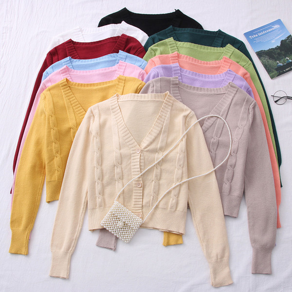 Ženski moderan prsluk s gumbima i V izrezom