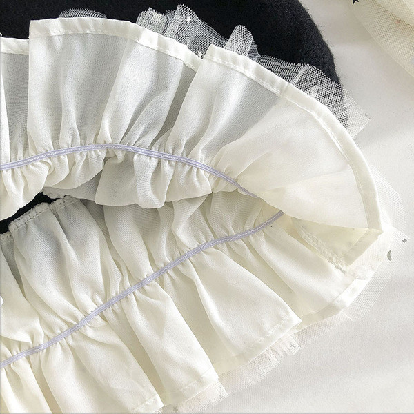 Μακρύ γυναικείο πουλόβερ με τούλι και κεντήματα αστέρι