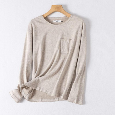 Laia mudeliga sviiter taskuga õhukesest kudumisest