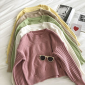 Μοντέρνο μονόχρωμο γυναικείο πουλόβερ με στρογγυλή λαιμόκοψη