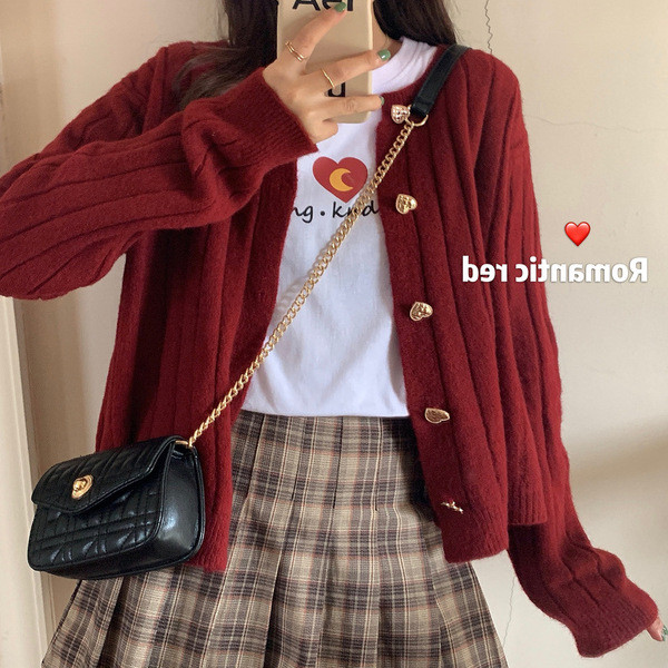 Naiste vabaaja vest nööpide ja ovaalse kaelusega