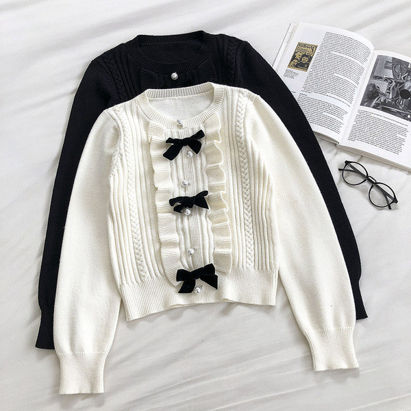 Γυναικείο πουλόβερ μοντέρνο με κορδέλες και στρογγυλή λαιμόκοψη