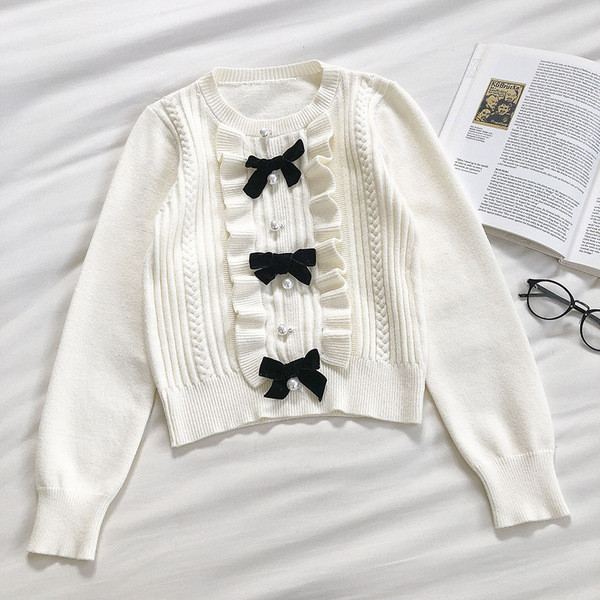 Γυναικείο πουλόβερ μοντέρνο με κορδέλες και στρογγυλή λαιμόκοψη