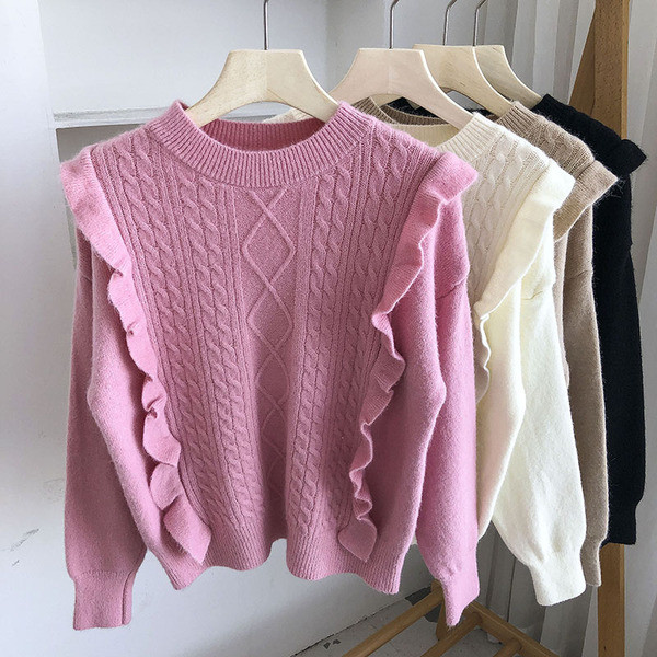 Aktualan ženski džemper sa kovrčama i okruglim izrezom