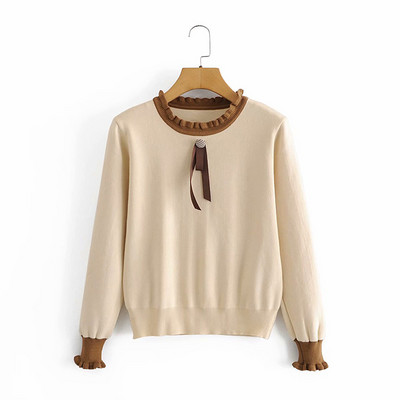 Õhukesest kudumisest lokkidega naiste kampsun