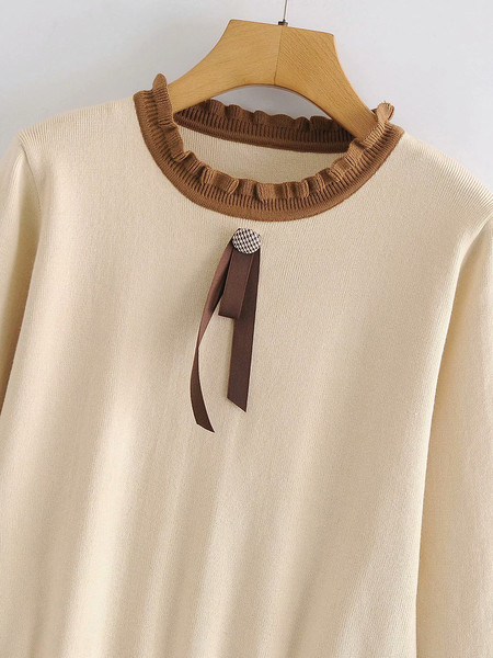 Õhukesest kudumisest lokkidega naiste kampsun