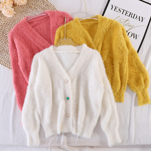 Naiste vabaaja värviliste nööpidega sulevest