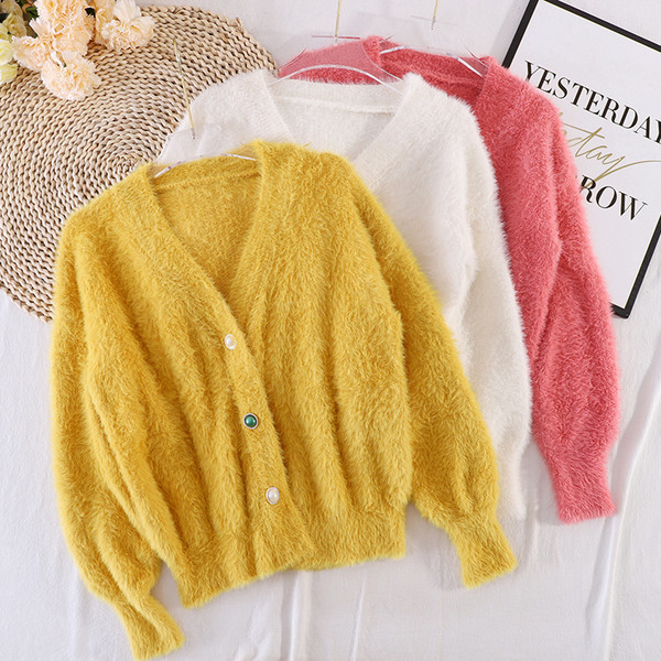 Naiste vabaaja värviliste nööpidega sulevest