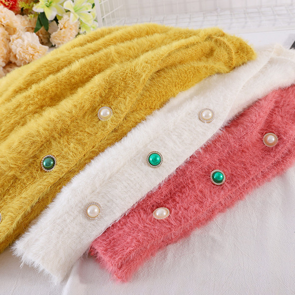 Naiste vabaaja värviliste nööpidega sulevest