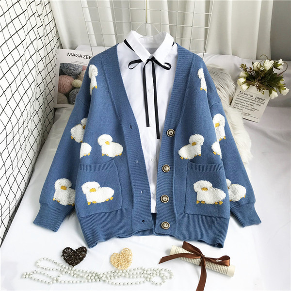 Модерна дамска жилетка с дълбоко шпиц деколте и джобове