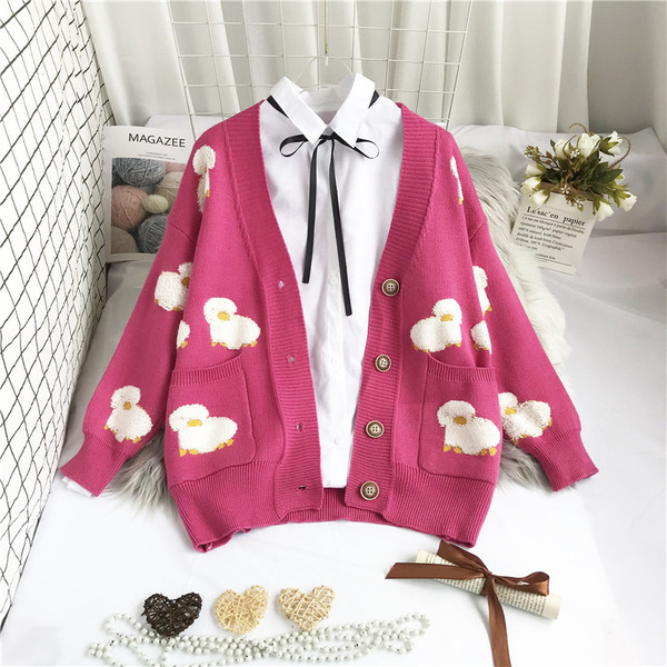 Модерна дамска жилетка с дълбоко шпиц деколте и джобове