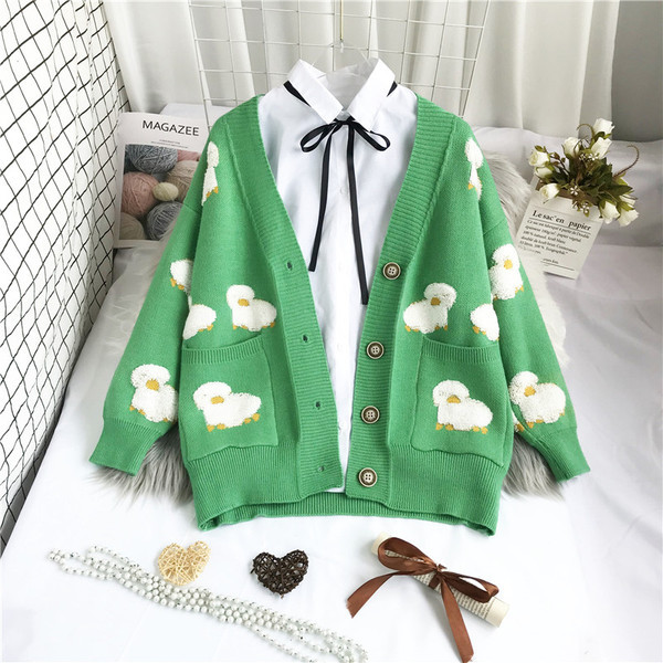 Модерна дамска жилетка с дълбоко шпиц деколте и джобове