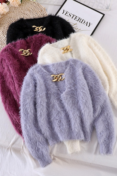 Naiste metallist ketiga sulekampsun