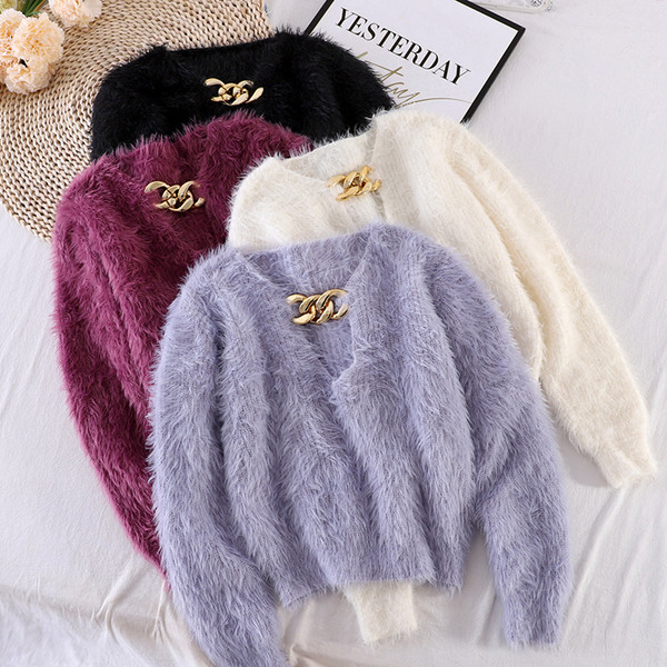 Naiste metallist ketiga sulekampsun