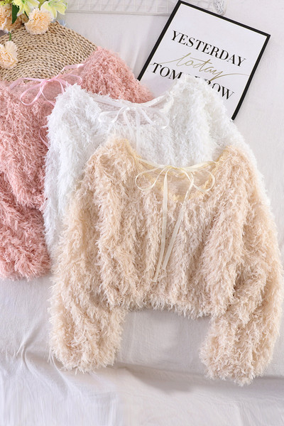 Naiste sulekampsun seljas paelaga