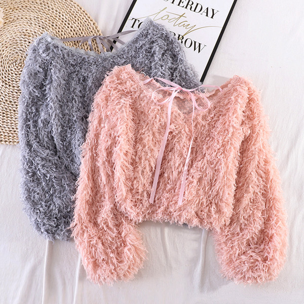 Naiste sulekampsun seljas paelaga