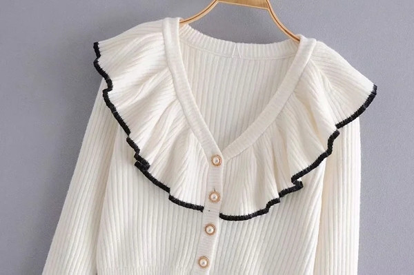 Нов модел жилетка с копчета перли