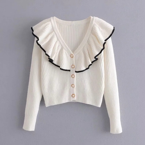 Нов модел жилетка с копчета перли