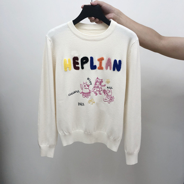 Γυναικείο πουλόβερ με οβάλ λαιμόκοψη και χρωματική επιγραφή